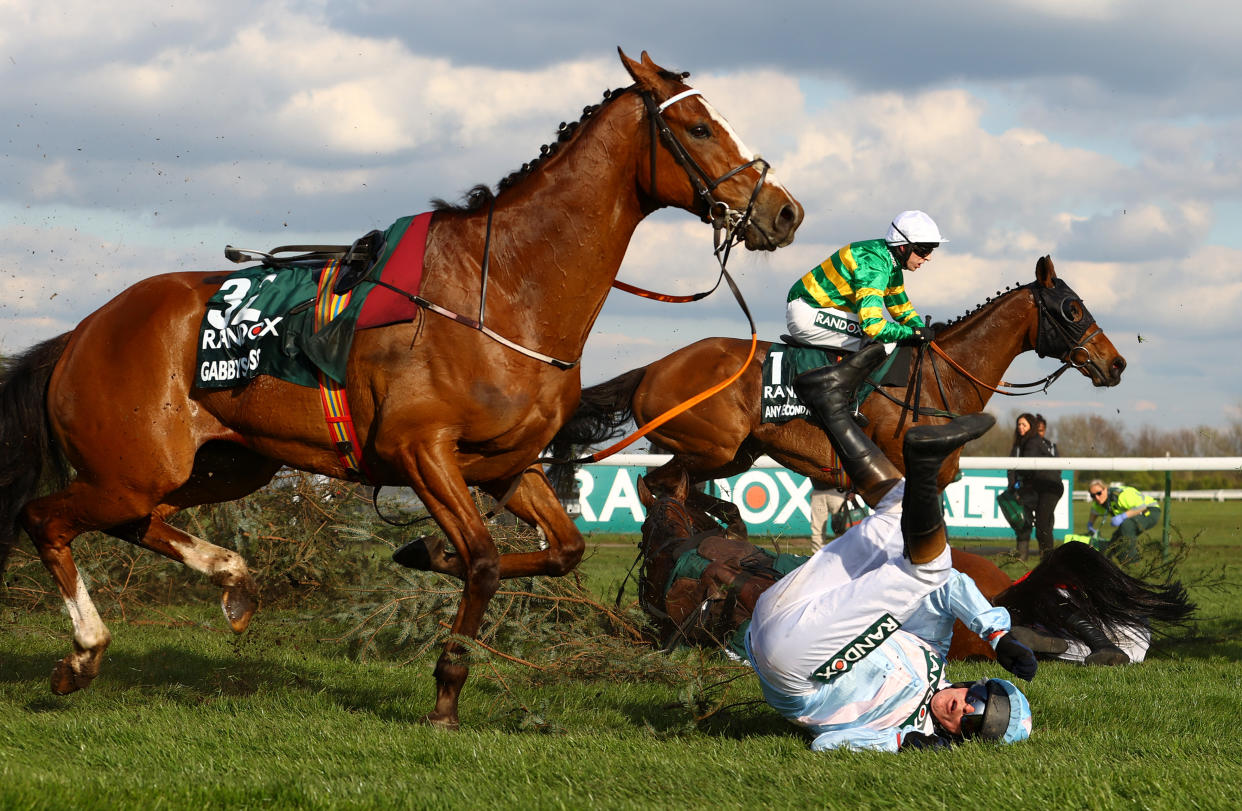 LIVERPOOL, ENGLAND - APRIL 15: Peter Carberry riding Gabbys Cross falls off during the Randox Grand National Chase during day three of the Randox Grand National Festival at Aintree Racecourse on April 15, 2023 in Liverpool, England. (Photo by Michael Steele/Getty Images)