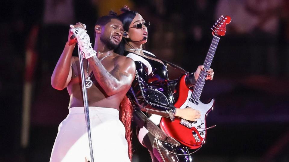 PHOTO: Usher performs with musician H.E.R. during the halftime show of Super Bowl LVIII in Las Vegas, Feb. 11, 2024.  (John G Mabanglo/EPA-EFE/Shutters)