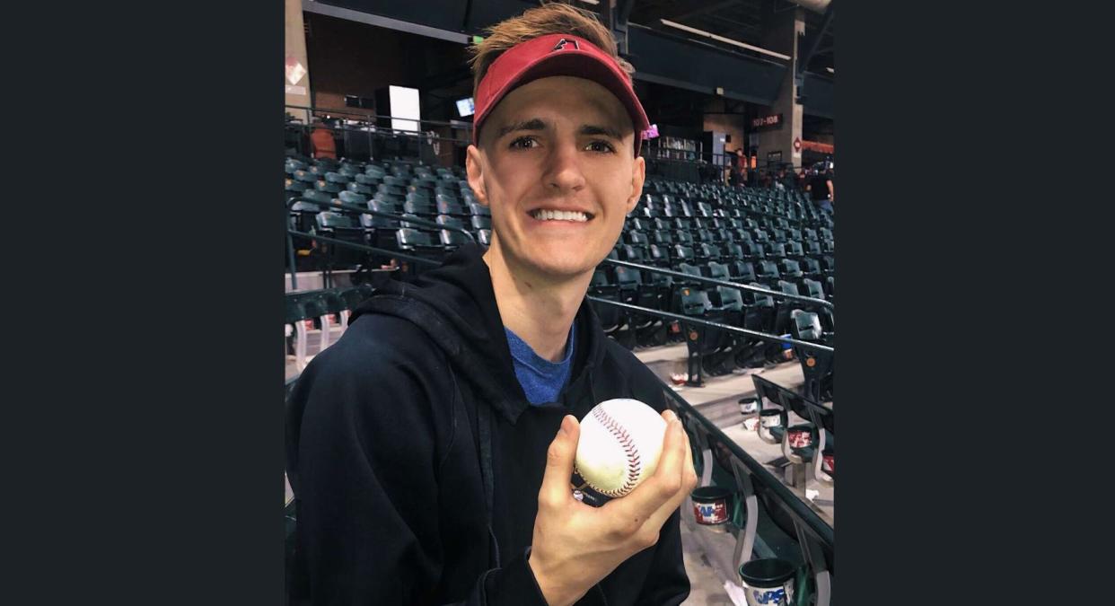 Alex Robertson was celebrating his 21st birthday at a baseball game, his dad's favorite sport, when he caught the game-winning home run ball. (Photo: Twitter)