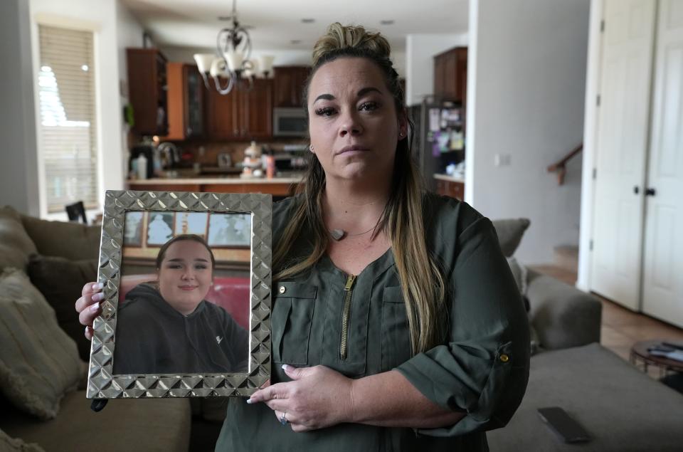 Misty Terrigino lost her 17-year-old daughter Kaylie Tallant to Fentanyl in 2021. Kaylie’s autopsy report says her death was accidental and due to "fentanyl toxicity." Terrigino is seen here holding a photo of her daughter Kaylie at the family home in San Tan Valley on Sept. 8, 2022.