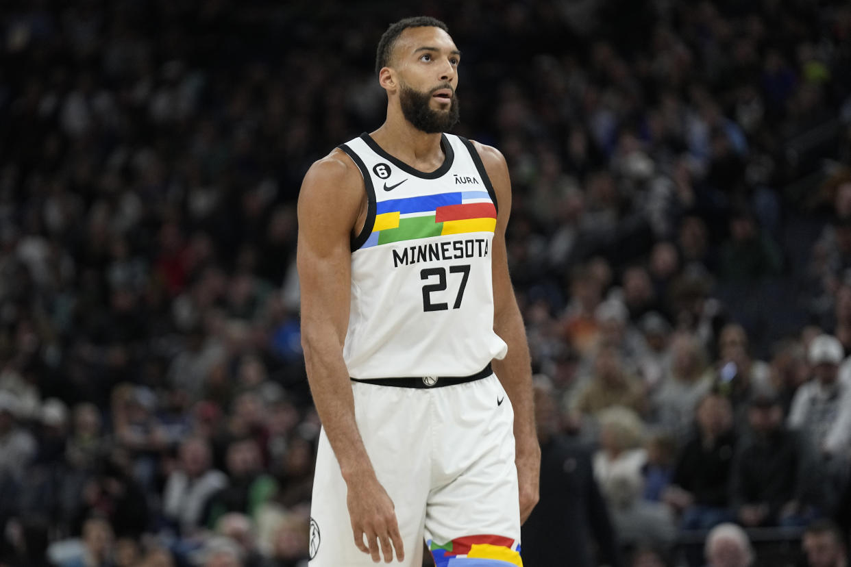 Minnesota Timberwolves center Rudy Gobert (27) looks on during the first half of an NBA basketball game against the Portland Trail Blazers, Sunday, April 2, 2023, in Minneapolis. (AP Photo/Abbie Parr)