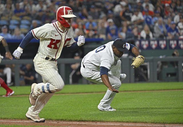 Kansas City Royals' Kyle Isbel, right, is congratulated by Jackie