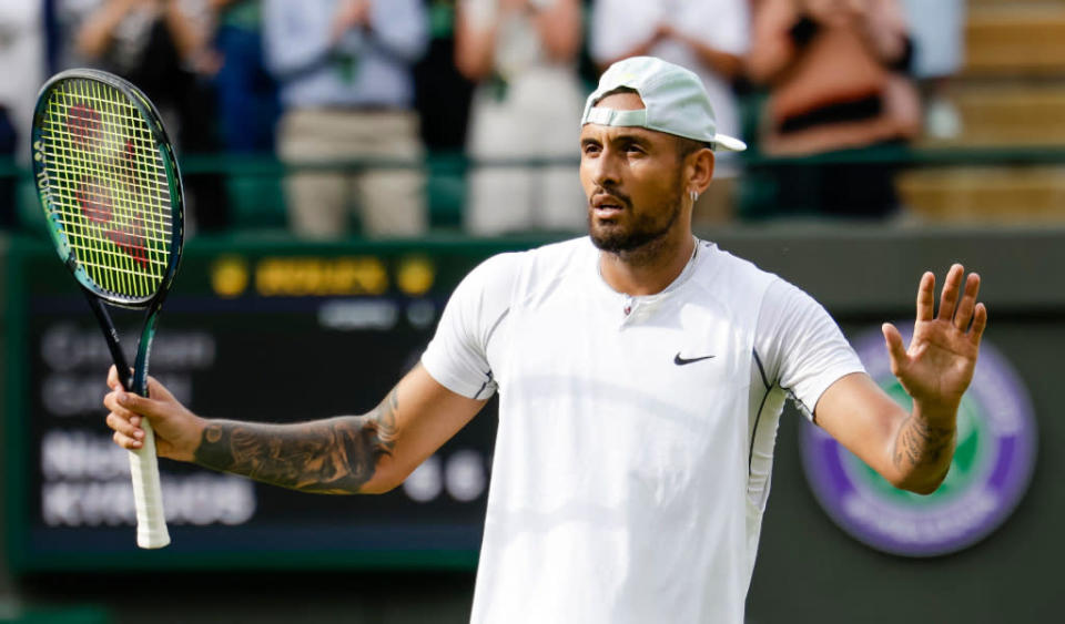 Nick Kyrgios gesturing Credit: PA Images