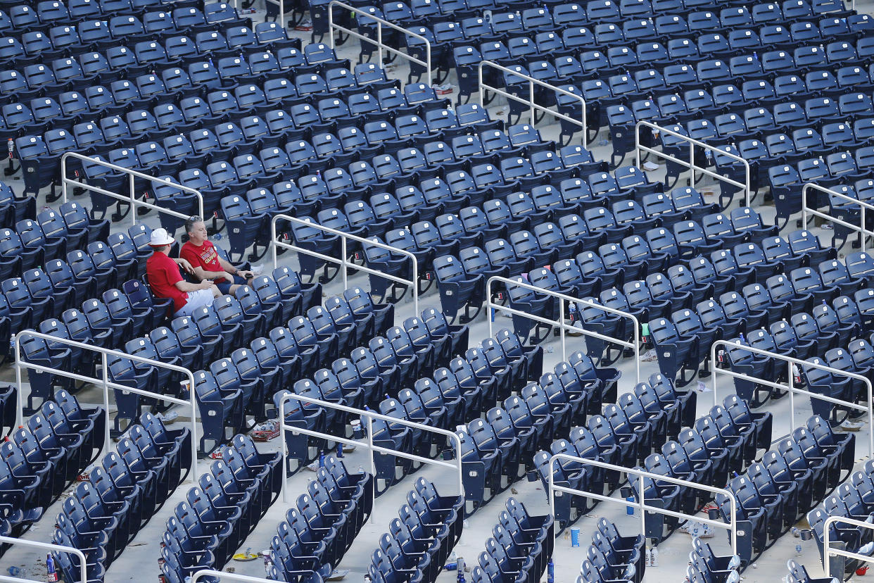 VARIOUS CITIES,  - MARCH 12:  Fans look on from their seats after a Grapefruit League spring training game between the Washington Nationals and the New York Yankees at FITTEAM Ballpark of The Palm Beaches on March 12, 2020 in West Palm Beach, Florida. The MLB suspended the remaining spring training games due to the ongoing threat of the Coronavirus (COVID-19) outbreak. (Photo by Michael Reaves/Getty Images)