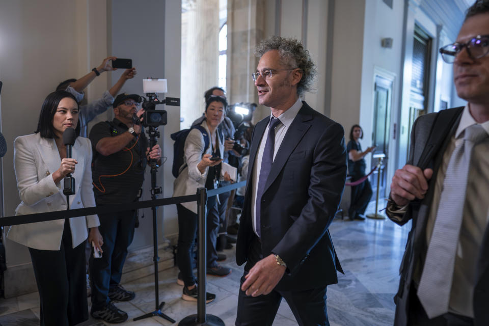 Alex Karp, CEO of the software firm Palantir Technologies, arrives as Senate Majority Leader Chuck Schumer, D, N.Y., convenes a closed-door gathering of leading tech CEOs to discuss the priorities and risks surrounding artificial intelligence and how it should be regulated, at the Capitol in Washington, Wednesday, Sept. 13, 2023. (AP Photo/J. Scott Applewhite)