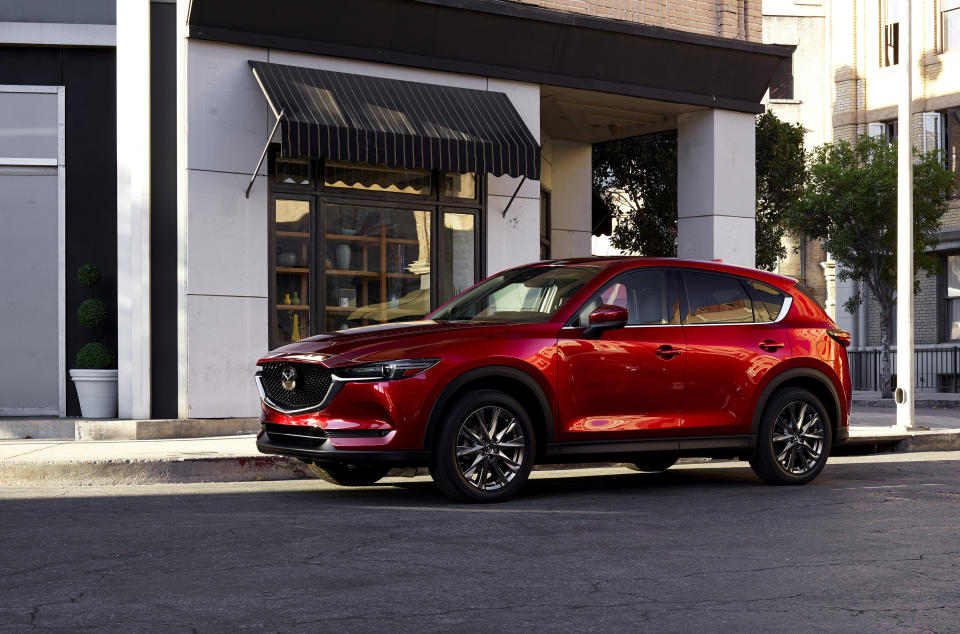 This photo provided by Mazda shows the 2021 Mazda CX-5, one of Edmunds' top-rated compact crossovers. The CX-5 is notable for its sharp styling, excellent handling and luxurious interior materials. (Courtesy of Mazda North American Operations via AP)