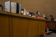 Scott Peterson, second from right, listens at the San Mateo County Superior Court in Redwood City, Calif., Thursday, Aug. 11, 2022. Peterson is in court for a hearing to determine whether he gets a new trial in the murder of his pregnant wife because of juror misconduct. (AP Photo/Jeff Chiu, Pool)