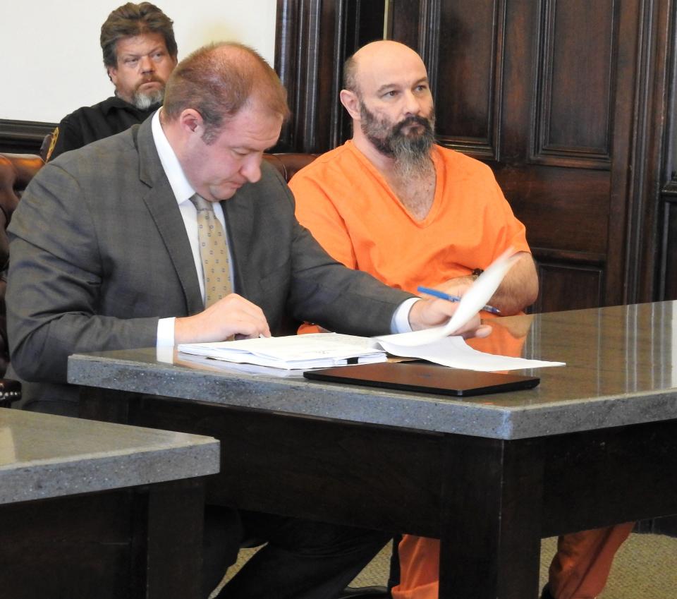 Attorney Zachuary Meranda with client Michael A. Smith Jr. Thursday in Coshocton County Common Pleas Court. Smith received an aggregate term of 30 to 35 years in prison, with the minimum term mandatory, for three counts of rape of a child who was between the ages of 9 to 13 at the time.