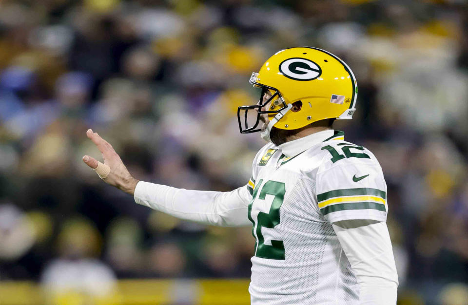 Green Bay Packers quarterback Aaron Rodgers gestures during the team's NFL football game against the Tennessee Titans on Nov. 17, 2022, in Green Bay, Wis. Rodgers acknowledged Wednesday, Nov. 23, that he’s been playing with a broken right thumb for the past six weeks. Rodgers hurt his thumb Oct. 9 during a foiled Hail Mary attempt on the final play of the Packers’ 27-22 loss to the New York Giants in London. Although the Packers have listed Rodgers with a thumb injury ever since, the four-time MVP hadn’t said publicly that it was broken. (AP Photo/Jeffrey Phelps)