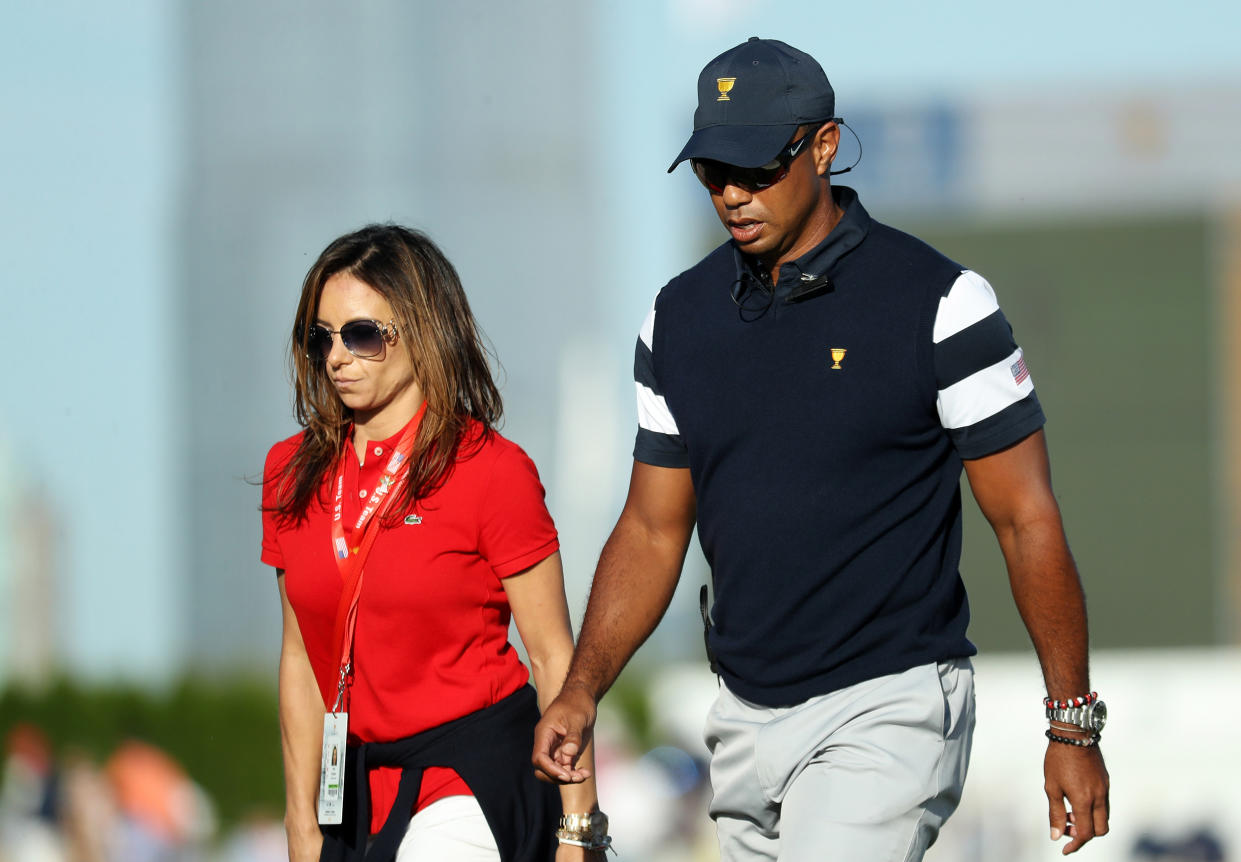 Tiger Woods, Erica Herman (Rob Carr / Getty Images)