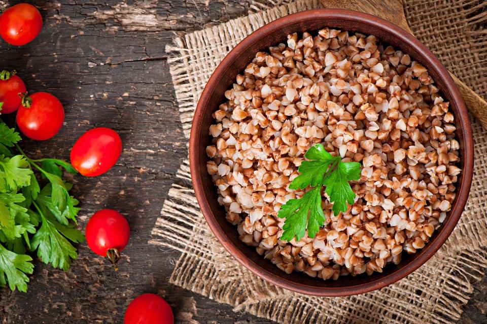 buckwheat porridge in an old ceramic bowl on a rustic style