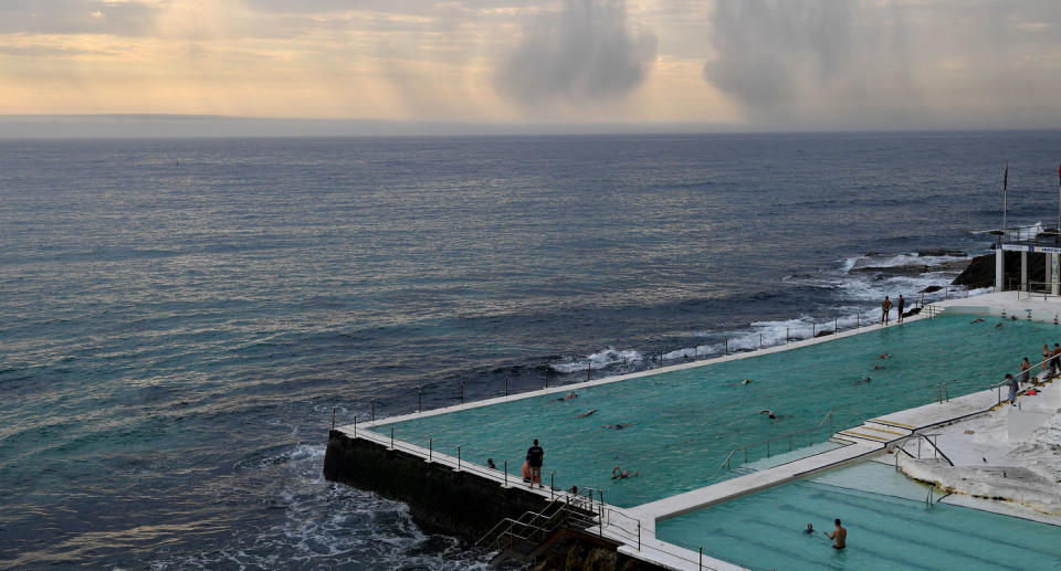 A storm is seen rolling in from Bondi Icebergs as wet weather is predicted for the city.