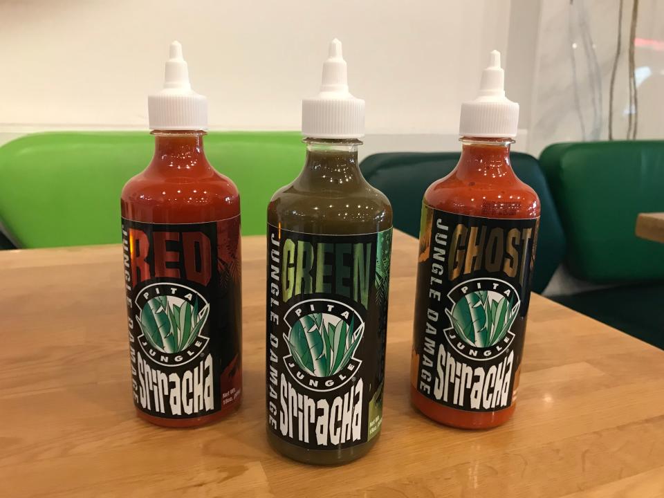 Pita Jungle's Sriracha sauces include Red, Green and Ghost. Each bottle of Sriracha retails for $7.95.