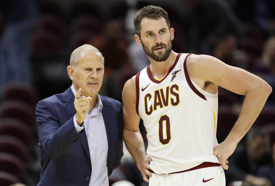 Cleveland Cavaliers head coach John Beilein, left, talks with Kevin Love in the first half of an NBA preseason basketball game against San Lorenzo, Monday, Oct. 7, 2019, in Cleveland. (AP Photo/Tony Dejak)