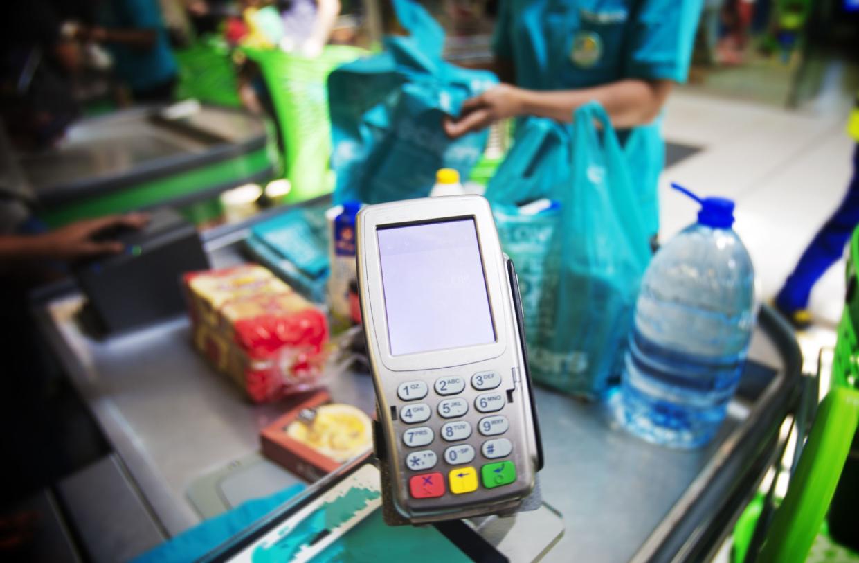 Credit card point of sale terminal at checkout