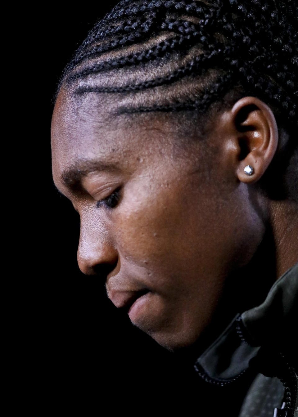 Caster Semenya, the current 800-meter Olympic gold and world champion from South Africa, and the latest recipient of the Wilma Rudolph Courage Award, listens during an interview, Monday, Oct. 15, 2018, in New York. Semenya has filed an appeal in the Court of Arbitration for Sport against the International Association of Athletics Federations (IAAF) ruling, forcing female runners to medicate to reduce their testosterone levels for six months before racing internationally. (AP Photo/Bebeto Matthews)