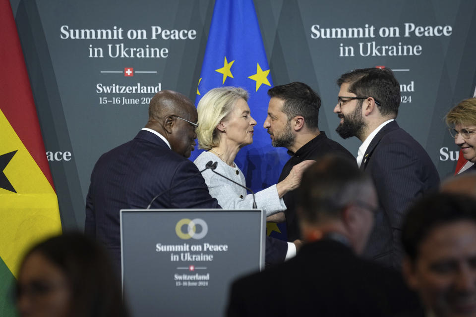 Ukraine's President Volodymyr Zelenskyy speaks with President of European Commission Ursula von der Leyen during the closing press conference of the Ukraine peace summit in Obbürgen, Switzerland, Sunday, June 16, 2024. Switzerland is hosting scores of world leaders this weekend to try to map out the first steps toward peace in Ukraine. (AP Photo/Laurent Cipriani)