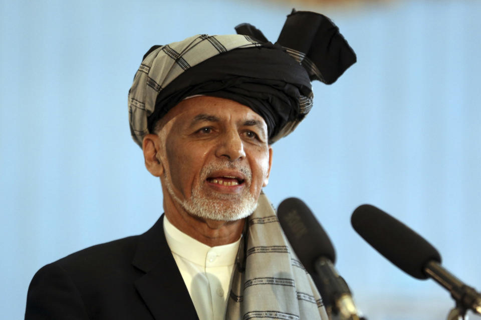 Afghan President Ashraf Ghani speaks to journalists after voting at Amani high school, near the presidential palace in Kabul, Afghanistan, Saturday, Sept. 28, 2019. Afghans headed to the polls on Saturday to elect a new president amid high security and Taliban threats to disrupt the elections, with the rebels warning citizens to stay home or risk being hurt. (AP Photo/Rahmat Gul)