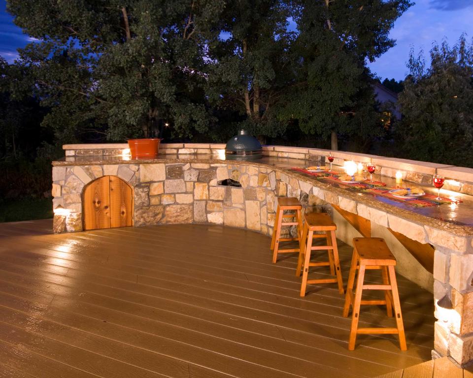 <p> Create a relaxing ambiance once the sun sets with deck lighting in your alfresco BBQ scheme.&#xA0; </p> <p> Whether you opt for recessed spotlights in the decking itself, strip lighting subtly tucked beneath countertops, or wall lights on adjacent fences, there are plenty of options to go for.&#xA0; </p> <p> As well as practical task lighting, consider adding lower lighting solutions too, to up the sense of romance once you&apos;re finished cooking. Think twinkling lanterns and low, glowy microlights woven around nearby potted shrubs, for instance. </p>