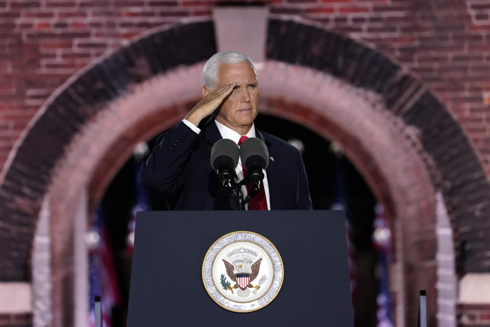 Vice President Mike Pence salutes as he speaks on the third day of the Republican National Convention at Fort McHenry National Monument and Historic Shrine in Baltimore, Wednesday, Aug. 26, 2020. (AP Photo/Andrew Harnik)