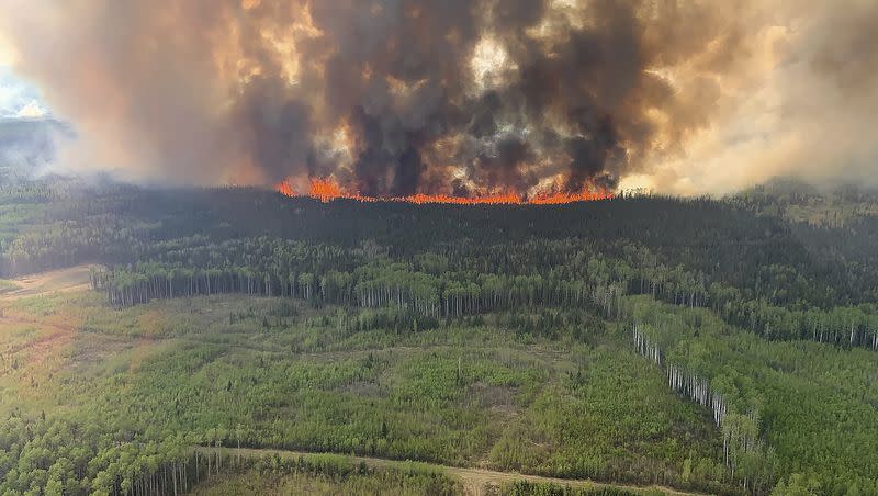 The Bald Mountain Wildfire burns in the Grande Prairie Forest Area in southwest Alberta, on Friday, May 12, 2023, in this handout image provided by the Government of Alberta. 