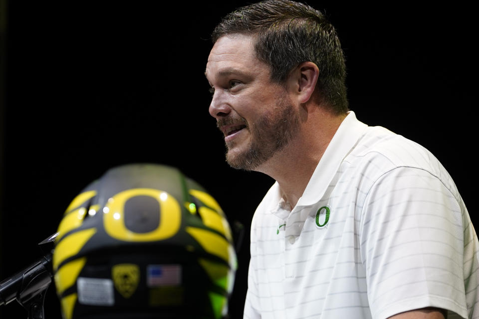 FILE - Oregon head coach Dan Lanning speaks during Pac-12 Conference men's NCAA college football media day Friday, July 29, 2022, in Los Angeles. Oregon first-year coach Lanning isn't dropping any clues about his starting quarterback this season. Fall camp has been a battle behind closed doors between transfer Bo Nix, redshirt freshmen Ty Thompson and Jay Butterfield. (AP Photo/Damian Dovarganes, File)