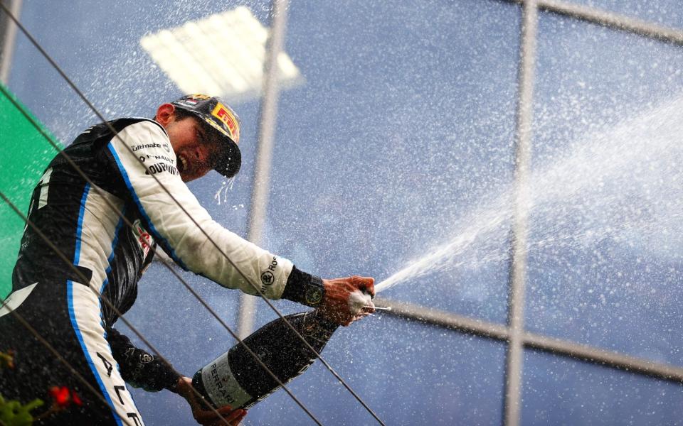 Race winner Esteban Ocon of France and Alpine F1 Team celebrates on the podium during the F1 Grand Prix of Hungary at Hungaroring on August 01, 2021 in Budapest, Hungary - Dan Istitene - Formula 1/Formula 1 via Getty Images