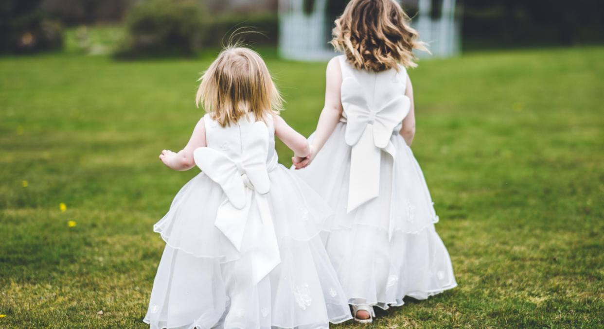 A bride has caused a stir on social media after banning her niece’s superhero-inspired dress. [Photo: Getty]