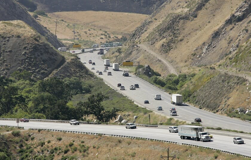 Vehicles traverse Interstate 5 in an area known as "The Grapevine" near Lebec, Calif. on Friday, June 6, 2008. (AP Photo/Dan Steinberg)