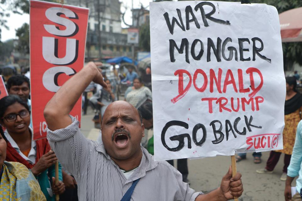 Activists of Socialist Unity Centre of India (Communist) shout slogans as they protest against US President Donald Trump's visit to India, in Siliguri February 24, 2020. - US President Donald Trump arrived in India on February 24 for a lightning visit featuring a huge rally at the world's biggest cricket stadium and other high-profile photo opportunities, but likely short on concrete achievements. (Photo by DIPTENDU DUTTA / AFP) (Photo by DIPTENDU DUTTA/AFP via Getty Images)