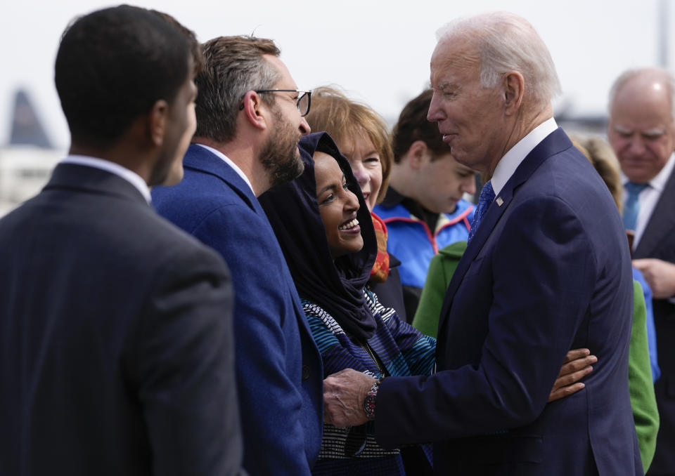 FILE - President Joe Biden hugs Rep. Ilhan Omar, D-Minn., as he is greeted at Minneapolis−Saint Paul International Airport, Monday, April 3, 2023, in Minneapolis. (AP Photo/Carolyn Kaster, File)