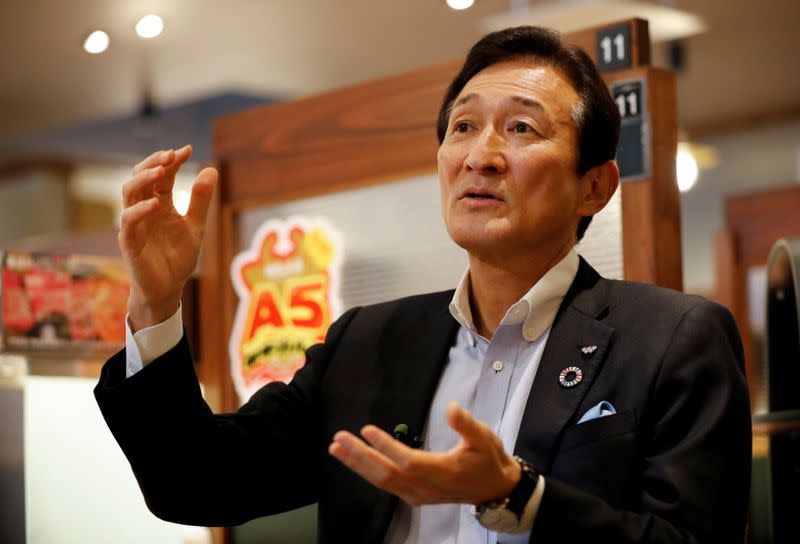 Miki Watanabe, Chairman and CEO of Watami Co. speaks during an interview with Reuters at the company's yakiniku barbecue restaurant named 'Yakiniku no Watami', in Tokyo