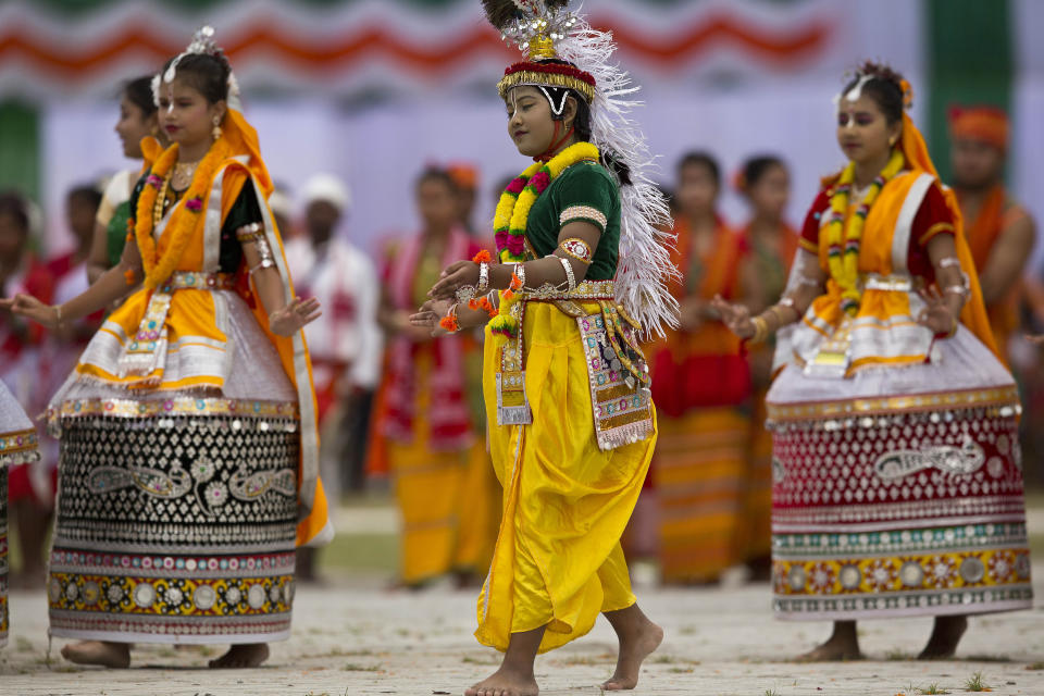 Women from India's northeastern Manipur state perform a traditional dance during the Indian Independence Day celebrations in Gauhati, India, Wednesday, Aug. 15, 2018. India won independence from British colonialists in 1947. (AP Photo/Anupam Nath)