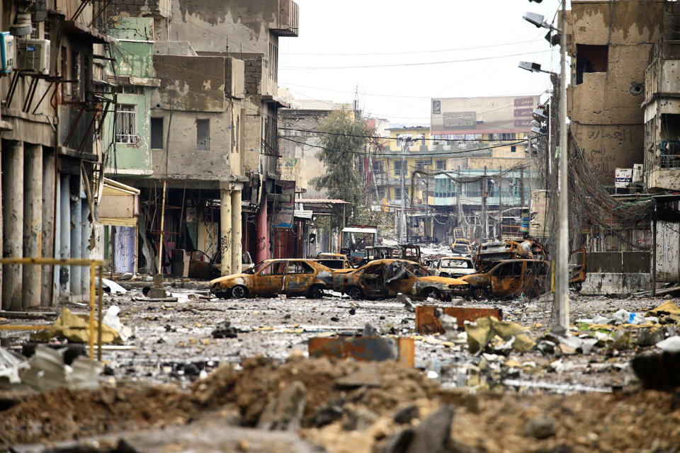 Cars burnt and destroyed by clashes in Mosul