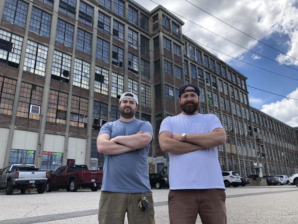 Local businessmen Isaac Ellowitz, left, and Justin Graves now own the mill at 72 Emery Street in Sanford, Maine.