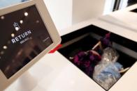 The clothing return drop off bin is seen at the Rent The Runway store, an online subscription service for women to rent designer dress and accessory items, in New York City