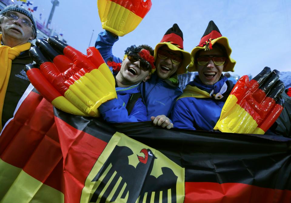 German fans cheer during the women's freestyle skiing moguls qualification round at the 2014 Sochi Winter Olympic Games in Rosa Khutor, February 8, 2014. REUTERS/Mike Blake (RUSSIA - Tags: SPORT SKIING OLYMPICS)