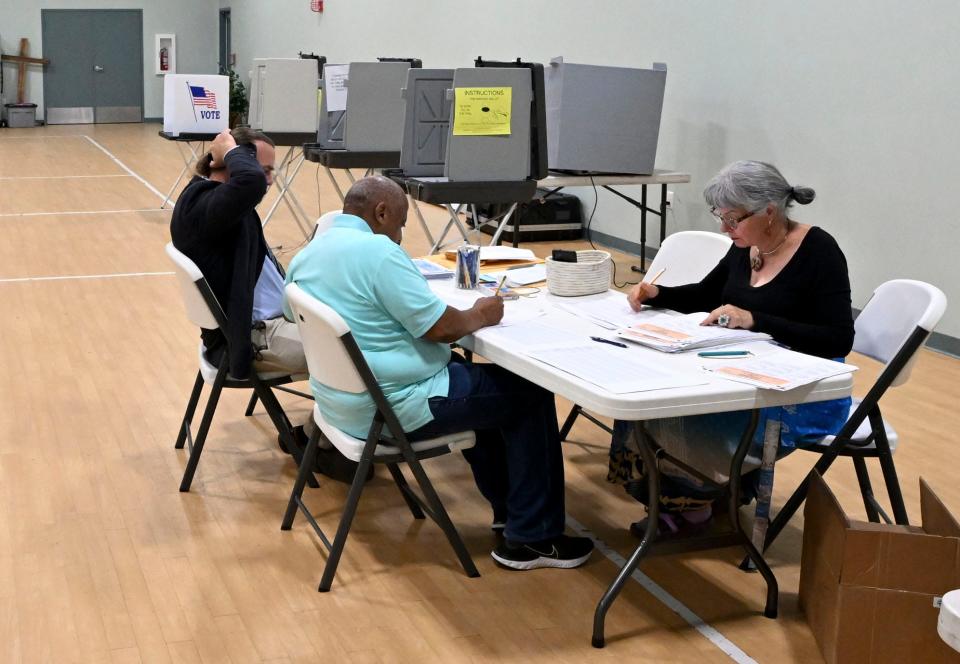 Election workers count ballots for Barnstable precinct 10 at the Seventh Day Adventist Church in Osterville into early Wednesday morning, after a malfunction in a vault caused a four-hour delay in voting on Tuesday.