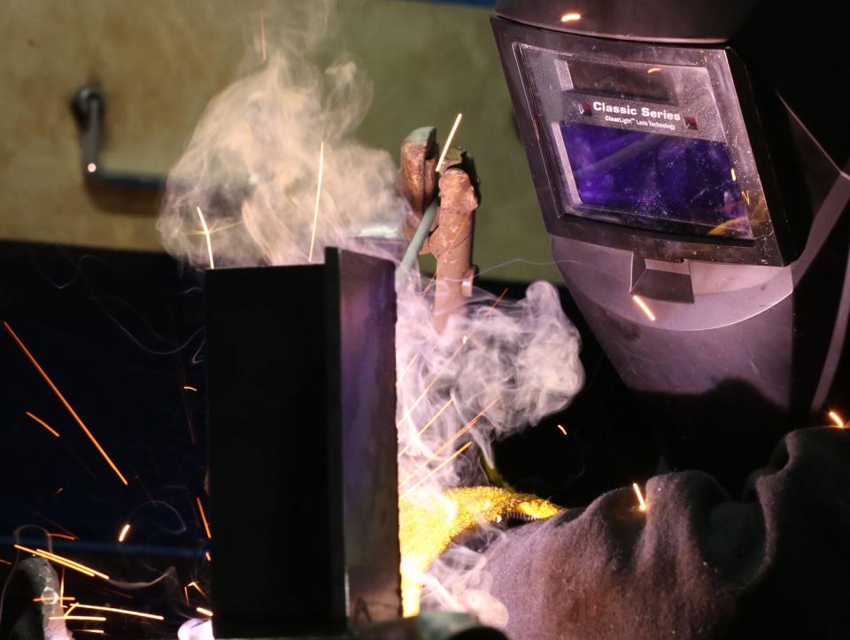Kings Mountain student Brianna Harrelson works on her welding project durning a welding competition held Friday, April 28, 2023, at Cleveland County Community College in Shelby.
