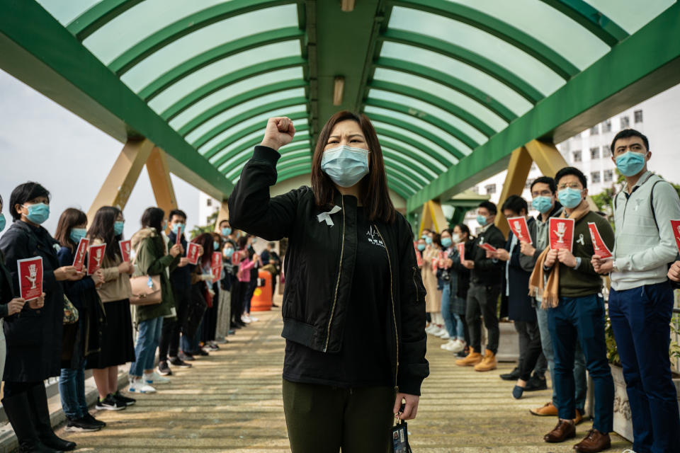 HONG KONG, CHINA - FEBRUARY 03: Medical workers hold a strike near Queen Mary Hospital to demand the government shut the city's border with China to reduce the spread of the coronavirus on February 3, 2020 in Hong Kong, China. Hong Kong has 15 confirmed cases of Novel coronavirus (2019-nCoV), with over 17,000 confirmed cases around the world, the virus has so far claimed over 300 lives. (Photo by Anthony Kwan/Getty Images)