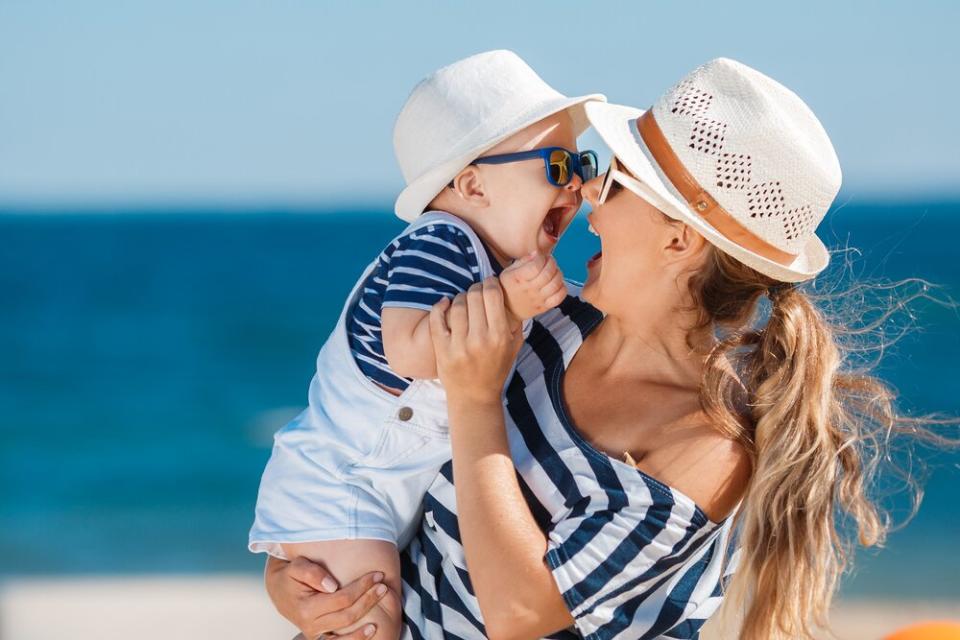 Mother and daughter on Summer beach vacation