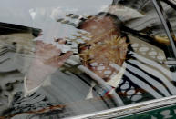 <p>The Duke of Edinburgh waves as he leaves in a car with the Queen from Buckingham Palace in London. Prince Philip will retire from royal duties this Autumn. (AP Photo/Matt Dunham) </p>