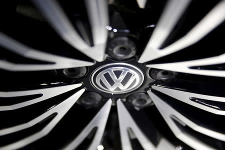 A Volkswagen sign is seen on a wheel of a car presented during an auto show in Beijing April 25, 2016. REUTERS/Damir Sagolj/File Photo