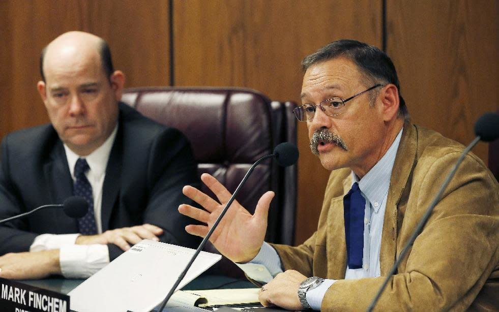 Arizona state Rep. Mark Finchem (right) wrote that there was no "far-right" at the Unite the Right rally in a 2017 blog post. (Photo: Associated Press)