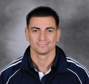 Canterbury volleyball coach Charlie Castillo