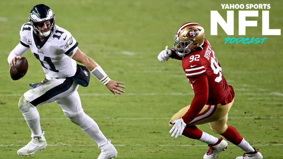 Carson Wentz escapes Kerry Hyder, Jr. on Sunday night as the Philadelphia Eagles earned their first win of the season against the San Francisco 49ers. (Photo by Ezra Shaw/Getty Images)