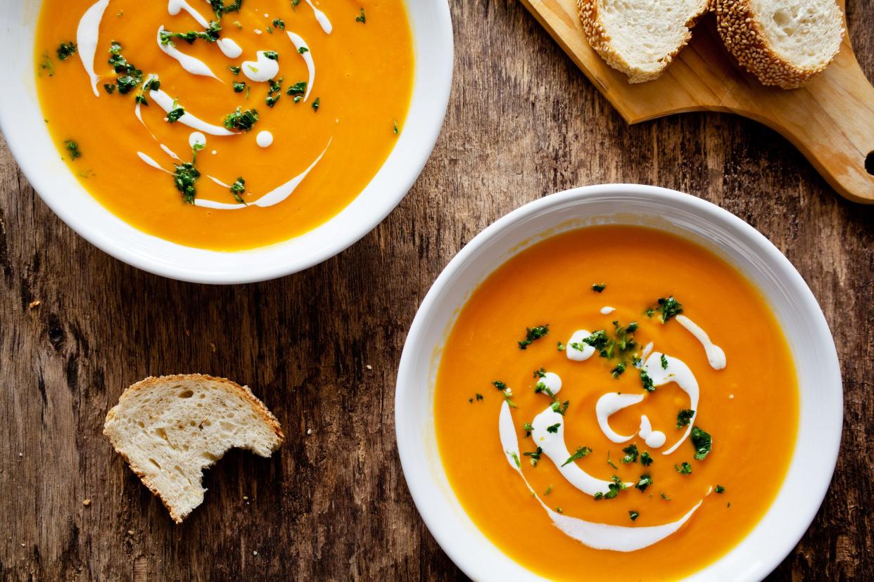 Couple of bowls of homemade soup with organic vegetables