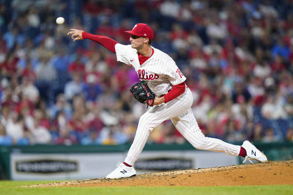Philadelphia Phillies' Connor Brogdon pitches during the seventh inning of a baseball game against the Pittsburgh Pirates, Friday, Aug. 26, 2022, in Philadelphia. (AP Photo/Matt Slocum)