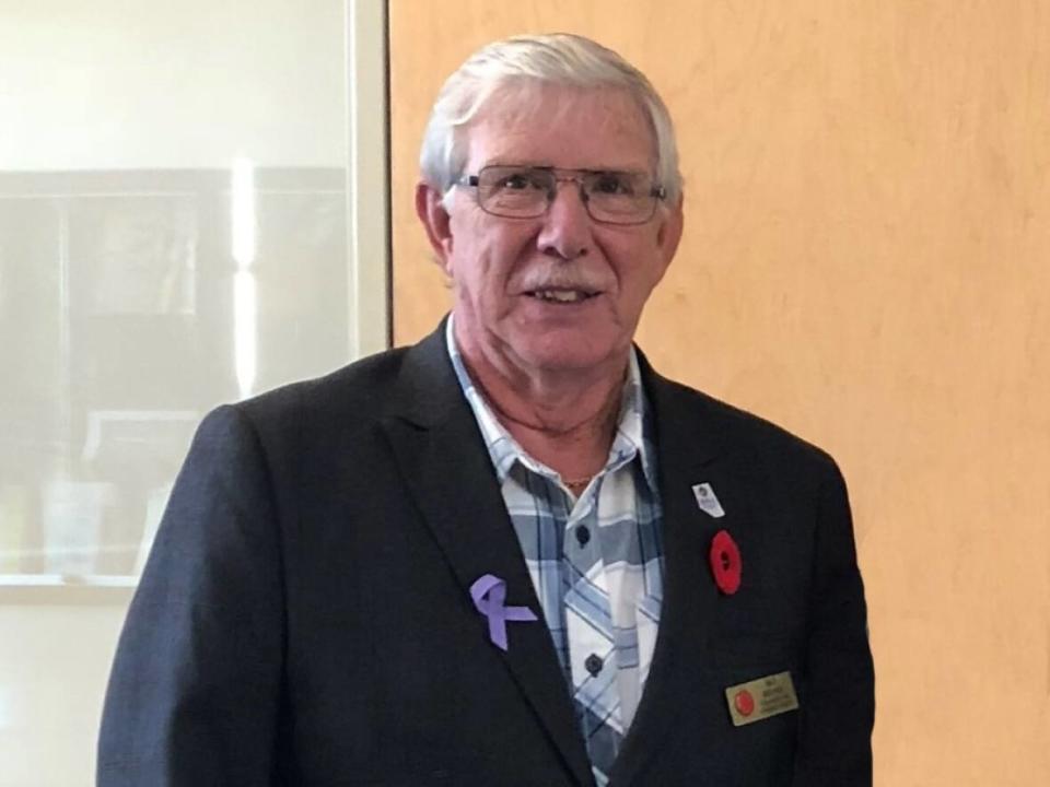 Alfred Belyea, shown here, was a Cypress County councillor (Ward 9). RCMP found him dead Friday and have charged his wife, Deborah Belyea, with second-degree murder and causing an indignity to a human body. (Cypress County/Facebook - image credit)