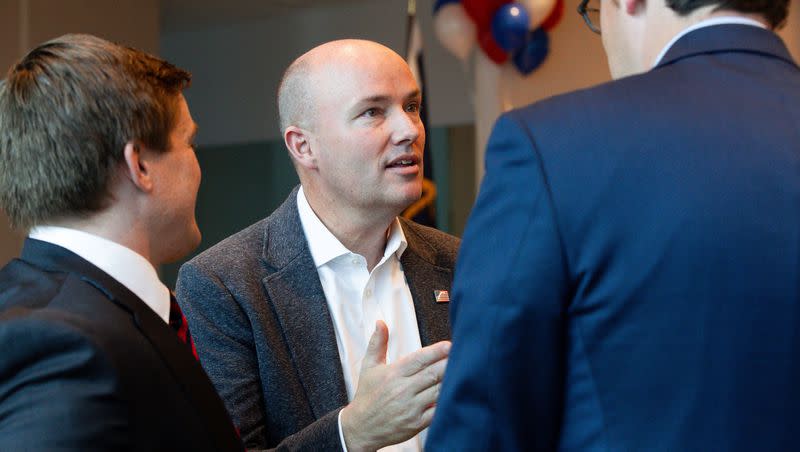 Rep. Tyler Clancy, R-Provo, left, and Utah Gov. Spencer Cox greet attendees at the Pathways to Purpose conference hosted by Clancy at the Provo Recreation Center in Provo on Saturday, Dec. 2, 2023.